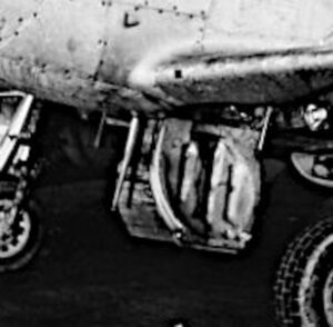 P-51D Mustang of the 46th Fighter Squadron showing the relocated radio antenna mast underneath the fuselage