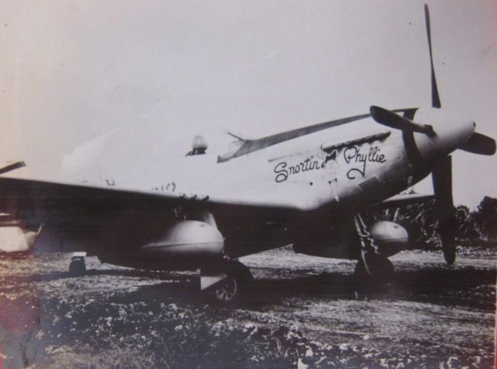 Unclear photographic view of P-51D Snortin’ Phyllie used to study its Uncle Dog antenna installation
